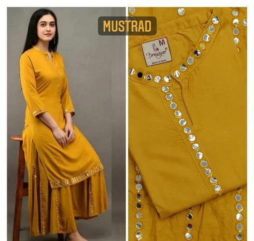Checkout this latest Kurta Sets
Product Name: *Kurta With Bottomwear*
Kurta Fabric: Rayon
Bottomwear Fabric: Rayon
Fabric: Rayon
Sleeve Length: Three-Quarter Sleeves
Set Type: Kurta With Bottomwear
Bottom Type: Sharara
Pattern: Embroidered
Net Quantity (N): Single
Sizes:
S (Bust Size: 32 in, Shoulder Size: 15 in, Kurta Waist Size: 34 in, Kurta Hip Size: 40 in, Kurta Length Size: 36 in, Bottom Waist Size: 24 in, Bottom Hip Size: 35 in, Bottom Length Size: 42 in) 
M (Bust Size: 36 in, Shoulder Size: 15.5 in, Kurta Waist Size: 36 in, Kurta Hip Size: 44 in, Kurta Length Size: 38 in, Bottom Waist Size: 26 in, Bottom Hip Size: 37 in, Bottom Length Size: 43 in) 
L (Bust Size: 38 in, Shoulder Size: 16.5 in, Kurta Waist Size: 38 in, Kurta Hip Size: 45 in, Kurta Length Size: 40 in, Bottom Waist Size: 27 in, Bottom Hip Size: 38 in, Bottom Length Size: 43 in) 
XL (Bust Size: 42 in, Shoulder Size: 17.5 in, Kurta Waist Size: 40 in, Kurta Hip Size: 46 in, Kurta Length Size: 42 in, Bottom Waist Size: 29 in, Bottom Hip Size: 40 in, Bottom Length Size: 44 in) 
XXL (Bust Size: 44 in, Shoulder Size: 18.5 in, Kurta Waist Size: 42 in, Kurta Hip Size: 48 in, Kurta Length Size: 44 in, Bottom Waist Size: 30 in, Bottom Hip Size: 41 in, Bottom Length Size: 44 in) 
XXXL (Bust Size: 46 in, Shoulder Size: 20 in, Kurta Waist Size: 44 in, Kurta Hip Size: 50 in, Kurta Length Size: 46 in, Bottom Waist Size: 32 in, Bottom Hip Size: 43 in, Bottom Length Size: 44 in) 
? catlogue Name : Mohini  ???? Colour : 8( GREEN, MAROON, BLACK, WHITE, GREY, WINE, MUSTRED, BLUE)   ? Kurti Fabric : Havy 14 kg rayon with mirror work  ? SIZE : S -(36), M -(38), L -(40),XL -(42),XXL -(44), XXXL -(46)  ?  *plazzo Fabric :- pure havy rayon  fabric sharara                        highlighted with mirror work* (Free size)*  -? DESCRIPRTION :- PURE HAVY RAYON FABRIV WITH CLASSICAL MIRROR WORK, sharara having kalis flair  and highlighted with mirror work  ? Full STOCK available  ? Quality
Country of Origin: India
Easy Returns Available In Case Of Any Issue


SKU: mustrad mohini
Supplier Name: M fab

Code: 104-54961918-999

Catalog Name: Jivika Drishya Women Kurta Sets
CatalogID_14049548
M03-C04-SC1003
