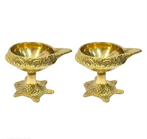Checkout this latest Festive Diyas
Product Name: *Brass Kuber Diya/Pital Jyot Diva/Pooja Deepak/Table Diaa on Tortoise - Unique Design, Home Decorative Oil Lamp for Puja, Diwali (Set of 2)*
Material: Brass
Net Quantity (N): Pack of 2
MATERIAL : This product is made from Brass material. This is beautiful decorative tortoise design Kuber Diya which provide a unique and vintage look of your home TRADITIONAL DESIGN : Bring home this Kuber Diya from Reshaz World, each diya weighs around 50 gm and is a must have for every occasion especially for deepawali/Diwali. This traditional design is very appealing and eye catching as a home decor item USE : This Diya is used for lighting lamp using the cotton wicks. It is an integral custom or tradition to start all the auspicious events by lighting the lamp to create a spiritual atmosphere MAKE IT APPEAR LOVELY : This beautiful kuber diya from the house of Reshaz World. Made from premium quality material, these diyas are safe to use. With a unique tortoise design, these diyas will change the decor of your room and make it appear lovely GOOD TO BE GIFTED : This Traditional design Diya is used for Diwali, spiritual lucky gift, wedding, Diwali, thanksgiving gift, birthday gifts. Perfect for worship place as well as special occasions or festivities
Country of Origin: India
Easy Returns Available In Case Of Any Issue


SKU: 1txprg-b
Supplier Name: BHAVPREETA

Code: 923-56444720-994

Catalog Name: Ravishing Festive Diya
CatalogID_14532310
M08-C25-SC1604