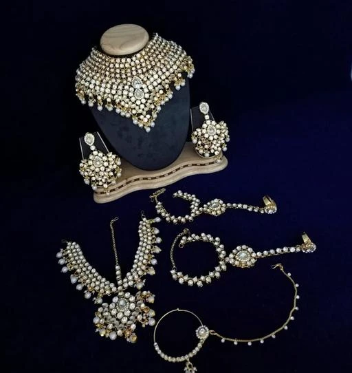 Checkout this latest Jewellery Set
Product Name: *Allure Glittering Jewellery Sets*
Base Metal: Alloy
Plating: Gold Plated
Stone Type: Artificial Stones & Beads
Sizing: Adjustable
Type: Full Bridal Set
Multipack: 1
Country of Origin: India
Easy Returns Available In Case Of Any Issue


Catalog Rating: ★4 (7)

Catalog Name: Allure Glittering Jewellery Sets
CatalogID_14812696
C77-SC1093
Code: 0121-57333229-9991