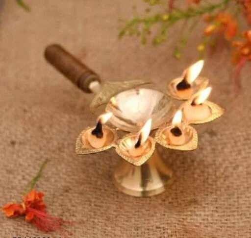 Checkout this latest Puja Articles
Product Name: * Pure Brass Panch Deepak Aarti, Brass Diya for Pooja, Diya Stand for Mandir Use, Pack of 1 Copper Table Diya / aarti diya / arti diya / aarti stand / pancharti diya Brass Table Diya  (Height: 4 inch)*
Material: Brass
Type: Puja Chowki
Country of Origin: India
Easy Returns Available In Case Of Any Issue


SKU: BRASS WOODEN PANCHARTI
Supplier Name: Baniya JI

Code: 591-58116591-004

Catalog Name: Classy Puja Articles
CatalogID_15071073
M08-C25-SC2506