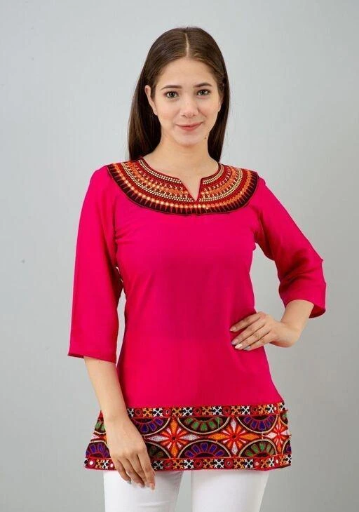 Checkout this latest Tops & Tunics
Product Name: *Comfy Fashionista Women Tops & Tunics*
Fabric: Rayon
Sleeve Length: Three-Quarter Sleeves
Pattern: Embroidered
Multipack: 1
Sizes:
XS, S (Bust Size: 34 in) 
M (Bust Size: 36 in) 
L (Bust Size: 40 in) 
XL (Bust Size: 42 in) 
Country of Origin: India
Easy Returns Available In Case Of Any Issue


Catalog Rating: ★4.1 (68)

Catalog Name: Comfy Fashionista Women Tops & Tunics
CatalogID_15360119
C79-SC1020
Code: 872-58981299-994