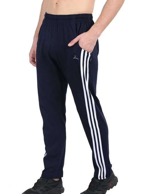 Checkout this latest Track Pants
Product Name: *Zeffit Men's Cotton Blend Fitness Trackpants Navy*
Fabric: Cotton Blend
Pattern: Self-Design
Net Quantity (N): 1
These lower/Track Pant from Zeffit are an ideal option for workout sessions or to spend a comfortable weekend at home or at night. made from fine quality of cotton blend , these lowers are light in weight and soft against the skin.It has two pockets and elasticated waistband
Sizes: 
30 (Waist Size: 30 in, Length Size: 36 in) 
32 (Waist Size: 32 in, Length Size: 38 in) 
34 (Waist Size: 34 in, Length Size: 40 in) 
36 (Waist Size: 36 in, Length Size: 42 in) 
Country of Origin: India
Easy Returns Available In Case Of Any Issue


SKU: ZEFFIT3105-NAVY
Supplier Name: SANDEEP KNITWEARS

Code: 173-59059254-9911

Catalog Name: Zeffit Men Track Pants
CatalogID_15388496
M06-C15-SC1214