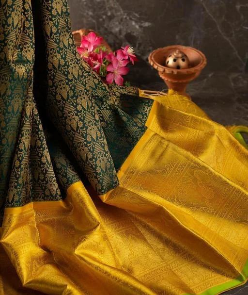 Checkout this latest Sarees
Product Name: *Attractive Fashionable Art Silk Sarees*
Saree Fabric: Silk
Blouse: Running Blouse
Blouse Fabric: Jacquard
Pattern: Woven Design
Blouse Pattern: Jacquard
Multipack: Single
Sizes: 
Free Size (Saree Length Size: 5.5 m, Blouse Length Size: 0.8 m) 
Country of Origin: India
Easy Returns Available In Case Of Any Issue


SKU: MTZZ etolien green
Supplier Name: KJR Enterprise

Code: 486-63066039-9901

Catalog Name: Abhisarika Fashionable Sarees
CatalogID_16754528
M03-C02-SC1004