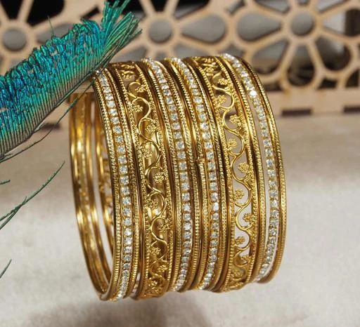 Checkout this latest Bracelet & Bangles
Product Name: *Designer 14 Pc. Oxidized Gold AD Bangle Set *
Base Metal: Alloy
Plating: Gold Plated
Stone Type: Cubic Zirconia/American Diamond
Sizing: Non-Adjustable
Type: Bangle Set
Multipack: More Than 10
Sizes:2.2, 2.4, 2.6
Country of Origin: India
Easy Returns Available In Case Of Any Issue


Catalog Rating: ★4.2 (135)

Catalog Name: Diva Elegant Bracelet & Bangles
CatalogID_16982026
C77-SC1094
Code: 061-63799255-055