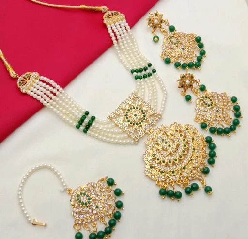 Checkout this latest Jewellery Set
Product Name: *Shimmering Chunky Jewellery Sets*
Base Metal: Brass
Plating: Oxidised Gold
Stone Type: Crystals
Sizing: Adjustable
Type: Necklace Earrings Maangtika
Net Quantity (N): 1
 This Rajasthani Choker has a fabulous GREEN pearl work at the neck side. It is made up of alloyed metal. The respective product is designed in a round shaped pendant with floral design in it. The accessories provided with this choker set is a pair of earrings having the same design and color as that of the pendant in the choker. Charm your look with RURU TRENDY FASHION'S new collection of choker sets. The choker set gives you a stunning look that shows a true grace of beauty and tradition.
Country of Origin: India
Easy Returns Available In Case Of Any Issue


SKU: CHICKSET/349
Supplier Name: RURU TRENDY FASHION JEWELLERY

Code: 982-63881709-999

Catalog Name: Shimmering Chunky Jewellery Sets
CatalogID_17007327
M05-C11-SC1093
.