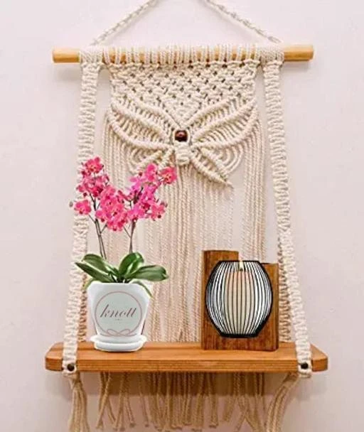 Checkout this latest Wall Decor & Hangings_500-1000
Product Name: *Macrame Wall Hanging Decor Shelfr*
Material: Handicraft
Ideal For: All Purpose
Type: Festive Toran
Product Length: 18 Inch
Product Height: 12 Inch
Product Breadth: 6 Inch
Multipack: 1
The Top Knott  Macramé Wall Hanging Shelf |930| Indoor Boho Wall Decor for Bedroom, Wood Hanging Shelf Organizer, Handmade Woven Cotton Rope Bohemian Home Wall Décor (Set of 1 ,Beige)
Easy Returns Available In Case Of Any Issue


SKU: Topl1
Supplier Name: The Top Knott

Code: 634-64458427-9921

Catalog Name: Ravishing Wall Decor & Hangings
CatalogID_17192662
M08-C25-SC2524