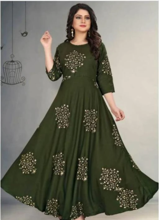 Checkout this latest Gowns
Product Name: *Trendy Rayon Green Printed Stylish Gown *
Fabric: Rayon
Sleeve Length: Three-Quarter Sleeves
Pattern: Printed
Net Quantity (N): 1
Sizes:
M (Bust Size: 38 in) 
L (Bust Size: 40 in) 
XL (Bust Size: 42 in) 
XXL (Bust Size: 44 in) 
Trendy Rayon Green Printed Stylish Gown Kurti
Country of Origin: India
Easy Returns Available In Case Of Any Issue


SKU: BF Trendy Rayon Green Printed Stylish Gown Kurti
Supplier Name: BABITAS FASHIONS

Code: 363-65563881-024

Catalog Name: Alisha Refined Gown 
CatalogID_17554715
M04-C07-SC1289