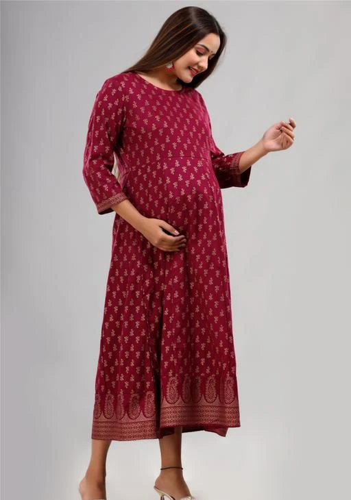 Checkout this latest Dresses
Product Name: *Trendy Sensational Women Maternity Dresses  *
Fabric: Rayon
Sleeve Length: Three-Quarter Sleeves
Pattern: Printed
Net Quantity (N): 1
Women Rayon anarkali Gown with Gold print having comfortable  and soft feel for body. Rayon fabric is versatie to the body giving comfort feel for pregnant lady. Anarkali kurti specially design for the ladies specially who want to wear exclusive long kurti in period of maternity .It has full flair having comfortable feel for the stomach part. Itan be wear in any season . any occasion . any festival 
Sizes: 
M (Bust Size: 38 in, Length Size: 50 in, Shoulder Size: 14 in, Waist Size: 36 in) 
L (Bust Size: 40 in, Length Size: 50 in, Shoulder Size: 15 in, Waist Size: 38 in) 
XL (Bust Size: 42 in, Length Size: 50 in, Shoulder Size: 16 in, Waist Size: 40 in) 
XXL (Bust Size: 44 in, Length Size: 50 in, Shoulder Size: 17 in, Waist Size: 42 in) 
Country of Origin: India
Easy Returns Available In Case Of Any Issue


SKU: M11
Supplier Name: Triveni Boutique and Fashion

Code: 473-66528651-008

Catalog Name: Pretty Partywear Women Maternity Dresses
CatalogID_17864852
M04-C53-SC1031