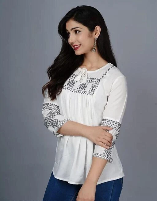 Checkout this latest Tops & Tunics
Product Name: *Pretty Ravishing Women Tops & Tunics*
Fabric: Rayon
Sleeve Length: Three-Quarter Sleeves
Pattern: Embroidered
Multipack: 1
Sizes:
S, M, L (Bust Size: 40 in, Length Size: 30 in) 
XL, XXL, XXXL
Country of Origin: India
Easy Returns Available In Case Of Any Issue


SKU: 101
Supplier Name: JAYA GARMENTS

Code: 192-67682669-9911

Catalog Name: Pretty Ravishing Women Tops & Tunics
CatalogID_18258566
M04-C07-SC1020