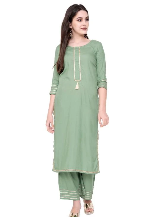 Checkout this latest Kurta Sets
Product Name: *Women Rayon Straight Solid Long Kurti With Palazzos*
Kurta Fabric: Rayon
Bottomwear Fabric: Rayon
Fabric: Rayon
Sleeve Length: Three-Quarter Sleeves
Set Type: Kurta With Bottomwear
Bottom Type: Palazzos
Pattern: Solid
Sizes:
S (Bust Size: 36 in, Kurta Length Size: 44 in, Bottom Waist Size: 30 in, Bottom Length Size: 38 in) 
M (Bust Size: 38 in, Kurta Length Size: 44 in, Bottom Waist Size: 32 in, Bottom Length Size: 38 in) 
L (Bust Size: 40 in, Kurta Length Size: 44 in, Bottom Waist Size: 34 in, Bottom Length Size: 38 in) 
XL (Bust Size: 42 in, Kurta Length Size: 44 in, Bottom Waist Size: 36 in, Bottom Length Size: 38 in) 
XXL (Bust Size: 44 in, Kurta Length Size: 44 in, Bottom Waist Size: 38 in, Bottom Length Size: 38 in) 
XXXL (Bust Size: 46 in, Kurta Length Size: 44 in, Bottom Waist Size: 40 in, Bottom Length Size: 38 in) 
5XL (Bust Size: 50 in, Kurta Length Size: 44 in, Bottom Waist Size: 44 in, Bottom Length Size: 38 in) 
Country of Origin: India
Easy Returns Available In Case Of Any Issue


SKU: NFKP0075-PISTA GREEN
Supplier Name: NEEL FAB & FASHION

Code: 825-6801741-0591

Catalog Name: NEEL FAB AND FASHION Women Rayon Straight Solid Long Kurti With Palazzos
CatalogID_1085429
M03-C04-SC1003