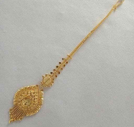 Checkout this latest Maangtika
Product Name: *Golden Maangtika Bridal Tika Tikli Gold Plated Tika for womens and girls*
Base Metal: Alloy
Plating: Gold Plated
Stone Type: No Stone
Type: Single stranded tikkas
Multipack: 1
Sizes: Free Size
Golden Maangtika for womens and girls. Handmade product from city of Kolkata. Manufactured under PKJ manufacturer. Best quality jewelleries at lowest price. Real image inventory. Light weight. Quality Assured!
Country of Origin: India
Easy Returns Available In Case Of Any Issue


SKU: PKJ1962NZ
Supplier Name: SOM VENTURES.

Code: 891-68322482-949

Catalog Name: Twinkling Graceful Maangtika
CatalogID_18472601
M05-C11-SC1100