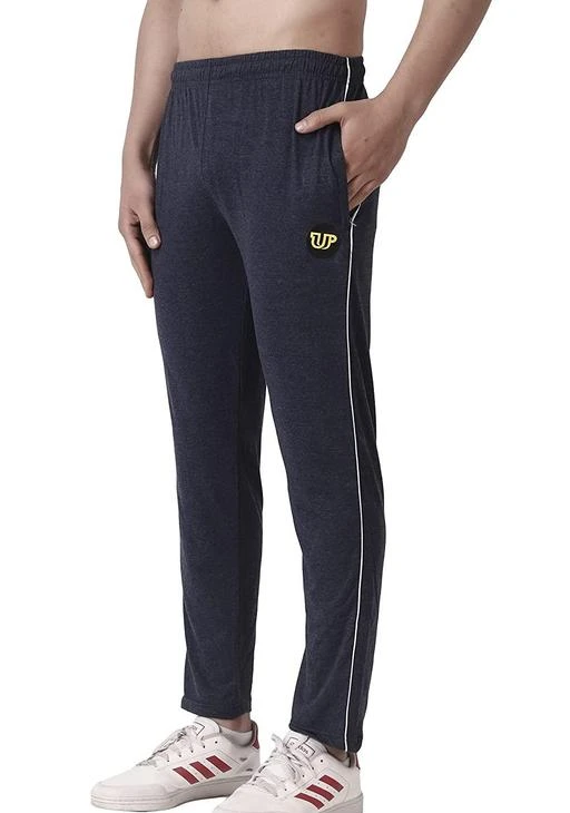 Checkout this latest Track Pants
Product Name: *UP Regular Fit Track Pants for Men/Track Pants for Men Sports/Track Pants for Men Running/Lower for Men Yoga Gym Workout Winter\ Pyjamas for Men*
Fabric: Cotton Blend
Pattern: Solid
Net Quantity (N): 1
•	Care Instructions: Hand Wash Only •	Fit Type: Regular •	Regular fit track pant for men : This trendy casual tracks for men is designed with white design on both the side pockets which makes you look stylish even when you are stretching your body hard. Elastic waistband : drawstring, Two side-seam pockets. •	Track pants for men sports-Stylish lower for men Stretchy and Lightweight Men's causal sport sweatpants strengthened crotch stitching and no worry tearing when running or riding. •	Track Pant for men: This gym wear pant is made of Lycra which makes it stretchable and you look stylish even when you are stretching your body hard •	Pyjamas for Men  -This trendy casual tracks for men is designed with white design on both the side pockets which makes you look stylish even when you are stretching your body hard.
Sizes: 
34 (Waist Size: 34 in, Length Size: 42 in) 
36 (Waist Size: 36 in, Length Size: 42 in) 
Country of Origin: India
Easy Returns Available In Case Of Any Issue


SKU: LW3_BLUE_
Supplier Name: SUDAN TRADING CO.

Code: 403-73244947-997

Catalog Name: Casual Fashionista Men Track Pants
CatalogID_20171239
M06-C15-SC1214