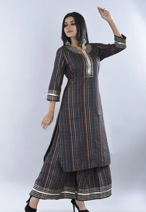 Checkout this latest Kurta Sets
Product Name: *Balaji fashion stylish beautiful Multicolor Rayon kurta sharara set for women and girls | casual wear officewear ethnic dress it comes with ¾ sleeves and roundneck with multicolor printed design and gottapati laces*
Kurta Fabric: Rayon
Bottomwear Fabric: Rayon
Fabric: Rayon
Sleeve Length: Three-Quarter Sleeves
Set Type: Kurta With Bottomwear
Bottom Type: Sharara
Pattern: Printed
Sizes:
M (Bust Size: 38 in, Kurta Length Size: 46 in, Bottom Length Size: 39 in) 
L (Bust Size: 40 in, Kurta Length Size: 46 in, Bottom Length Size: 39 in) 
XL (Bust Size: 42 in, Kurta Length Size: 46 in, Bottom Length Size: 39 in) 
XXL (Bust Size: 44 in, Kurta Length Size: 46 in, Bottom Length Size: 39 in) 
Country of Origin: India
Easy Returns Available In Case Of Any Issue


SKU: BF-108_MULTICOLOR
Supplier Name: BALAJI FASHION

Code: 125-73905909-9921

Catalog Name: Banita Fashionable Women Kurta Sets
CatalogID_20400297
M03-C04-SC1003