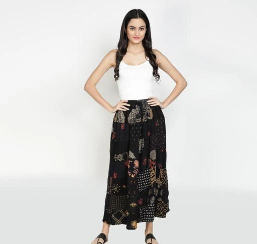 Checkout this latest Skirts
Product Name: *Gianna Trendy Cotton Printed Ethnic Skirt-Black*
Fabric: Cotton
Pattern: Printed
Net Quantity (N): 1
Gianna Trendy Cotton Printed Ethnic Skirt-Black
Sizes: 
28 (Waist Size: 28 in, Length Size: 38 in) 
30 (Waist Size: 30 in, Length Size: 38 in) 
32 (Waist Size: 32 in, Length Size: 38 in) 
34 (Waist Size: 34 in, Length Size: 38 in) 
36 (Waist Size: 36 in, Length Size: 38 in) 
38 (Waist Size: 38 in, Length Size: 38 in) 
Free Size (Waist Size: 42 in, Length Size: 38 in) 
Country of Origin: India
Easy Returns Available In Case Of Any Issue


SKU: SKRTPCHWORK-BLK
Supplier Name: MONA CREATIONS

Code: 953-73939838-999

Catalog Name: Kashvi Pretty Women Ethnic Skirts
CatalogID_20411619
M03-C06-SC1013