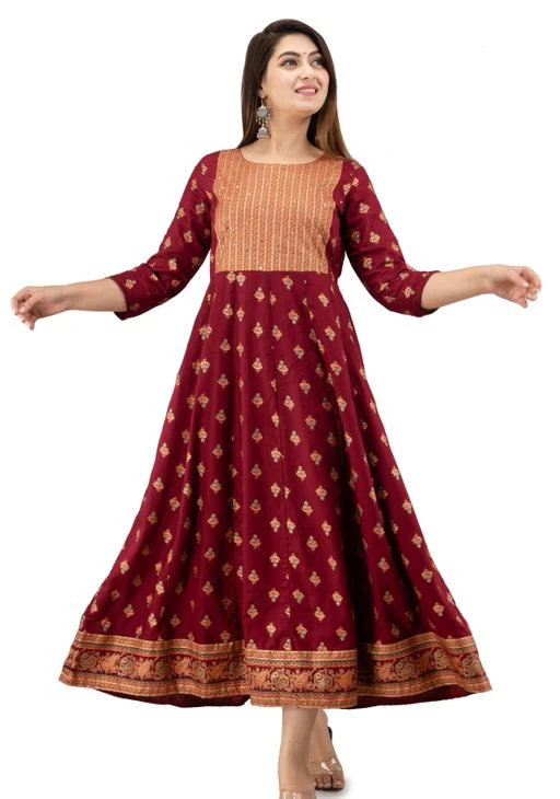Checkout this latest Kurtis
Product Name: *Women Floral Rayon Anarkali(Maroon) Alisha Alluring Kurtis*
Fabric: Rayon
Sleeve Length: Three-Quarter Sleeves
Pattern: Printed
Combo of: Single
Sizes:
M (Bust Size: 38 in, Size Length: 50 in) 
L (Bust Size: 40 in, Size Length: 50 in) 
XL (Bust Size: 42 in, Size Length: 50 in) 
XXL (Bust Size: 44 in, Size Length: 50 in) 
XXXL (Bust Size: 46 in, Size Length: 50 in) 
Fashion is like eating, you shouldn't stick to the same menu & Allmato will keep update your wardrobe with trending Styles. This Anarkali rayon ethnic dress from Allmato gives you exceptional look. As it is having Special patch work on yoke, it will give the premium attire to the wearer. (Note- Product color may slightly vary due to photographic lighting or your monitor/mobile setting.)
Country of Origin: India
Easy Returns Available In Case Of Any Issue


SKU: W1020MRN
Supplier Name: Allmato

Code: 184-74787401-9952

Catalog Name: Alisha Alluring Kurtis
CatalogID_20705359
M03-C03-SC1001