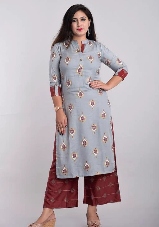 Checkout this latest Kurta Sets
Product Name: *Women Rayon A-line Printed Long Kurti With Palazzos*
Kurta Fabric: Rayon
Bottomwear Fabric: Rayon
Fabric: Rayon
Sleeve Length: Three-Quarter Sleeves
Set Type: Kurta With Bottomwear
Bottom Type: Palazzos
Pattern: Printed
Multipack: Single
Sizes:
L (Kurta Length Size: 45 in, Bottom Length Size: 39 in) 
XXL (Kurta Length Size: 45 in, Bottom Length Size: 39 in) 
Country of Origin: India
Easy Returns Available In Case Of Any Issue


Catalog Rating: ★4.2 (78)

Catalog Name: Women Rayon Slub Straight Printed Long Kurti With Palazzos
CatalogID_1214446
C74-SC1003
Code: 525-7527021-9911