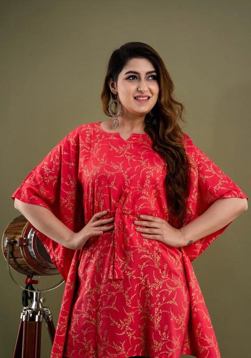 Checkout this latest Long Kaftans
Product Name: *Stylish Trendy Rayon Printed Women Kaftan Top Red*
Fabric: Rayon
Pattern: Printed
Multipack: 1
Sizes:
S (Length Size: 34 in) 
XL (Length Size: 34 in) 
L (Length Size: 34 in) 
XXXL (Length Size: 34 in) 
M (Length Size: 34 in) 
XXL (Length Size: 34 in) 
Comfortable clothing is always the best option and this beautiful Kaftan is a must- have item in your wardrobe .This Kaftan complements all body types with its long, loose design and slits front side. Flawless flared sleeves will add a great dimension to your style. Look absolutely chic when you are going out with your family and friends wear Our printed Kaftan with danglers earrings , create a great combination with sling bag and trendy heels and be a fashionista.
Country of Origin: India
Easy Returns Available In Case Of Any Issue


SKU: 1008-Red
Supplier Name: KRISHNAM FASHION

Code: 923-75573768-995

Catalog Name: Urbane Glamorous Women Kaftan 
CatalogID_20968393
M04-C07-SC1009