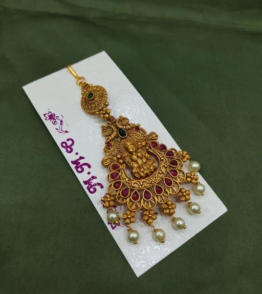 Checkout this latest Maangtika
Product Name: *Twinkling Graceful Maangtika*
Base Metal: Brass & Copper
Plating: Gold Plated
Stone Type: Artificial Stones & Beads
Type: Matha Patti
Sizes: Free Size
Country of Origin: India
Easy Returns Available In Case Of Any Issue


SKU: TK H 7
Supplier Name: BALAJI FASHION

Code: 801-75938342-941

Catalog Name: Twinkling Graceful Maangtika
CatalogID_21093676
M05-C11-SC1100