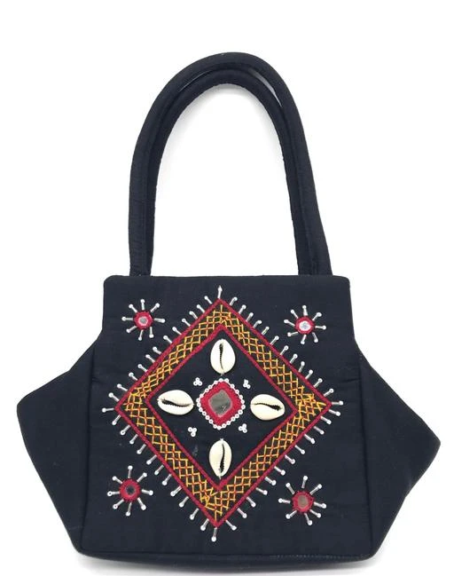 Checkout this latest Handbags (0-500)
Product Name: *Graceful Fancy Women Handbags*
Material: Fabric
No. of Compartments: 2
Pattern: Applique
Type: Handheld
Multipack: 1
Sizes:Free Size (Length Size: 9 in, Width Size: 4 in, Height Size: 6 in) 
ECO-FRIENDLY MATERIALS: This designer bag is made from premium soft Organic poplin cotton is extremely eco-friendly with Cowry Also Called Cowrie Koudi kaudi White shells stylish solid pattern a unique Aplic applique handbag is reusable cotton bag. Most popular designer small bag for women party wear to keep your accessories and all needed essentials. Women hobo bag mini. MADE IN INDIA - SriAoG Handcrafted bags Rajasthani Mini basket Bag features vibrantly colored hand embroidery mirror work hand bags women style. Double stitched stress points, strong handle and smooth zipper. This fashion tote handbag is ideal for daily life. This attractive Tote Bag is enriched with Aplic Patchwork stitched by hard working women. This handmade Totes is graced with hand Embroidery work in luscious colours is remarkable handwork of our artisans. The traditional Tote bag is decorated hand stich work. There is a Handmade Multicolor bucket Bag and border all around the Totes for a perfect finish. MATERIAL & DESIGN: Handbags for women. This beautiful shoulder satchel bag of ladies teens is made of Cotton.
Easy Returns Available In Case Of Any Issue


SKU: Black color stylish trendy hand bags for women
Supplier Name: SriAoG Traders

Code: 591-77279932-996

Catalog Name: Graceful Fancy Women Handbags
CatalogID_21549766
M09-C27-SC5082