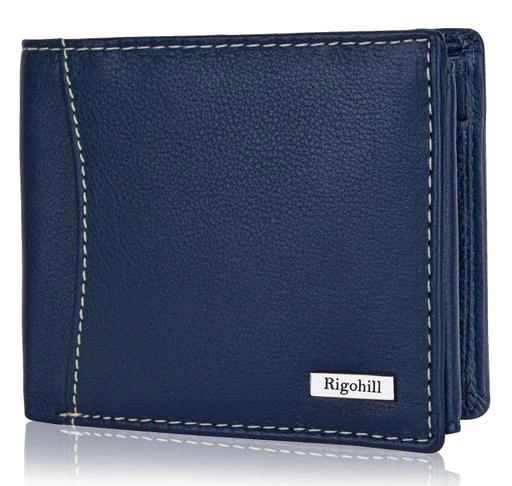 Checkout this latest Wallets
Product Name: *Rigohill Madrid Navy Leather Wallets for Men | Wallet Men Leather Branded.*
Material: Leather
No. of Compartments: 2
Pattern: Solid
Net Quantity (N): 1
Sizes: Free Size (Length Size: 10 cm, Width Size: 11 cm) 
TOP GRAIN LEATHER MENS WALLET LEATHER: This Wallet for men leather stylish Made in Exclusive High Quality Leather, Well Designed wallet men stylish leather By Skilled Handcraft Man, Durable Cloth Lining Used, Designed To Accommodate maximum needs. Each RFID Wallets for men Has Unique Natural Grain Of Genuine Leather Wallet for Men
Country of Origin: India
Easy Returns Available In Case Of Any Issue


SKU: RG171NV
Supplier Name: Blu Horizon

Code: 264-78134561-9942

Catalog Name: CasualModern Men Wallets
CatalogID_21848175
M06-C57-SC1221