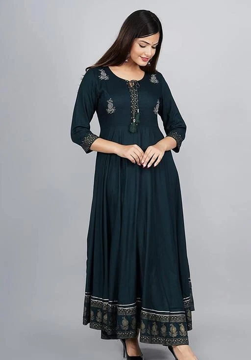 Checkout this latest Kurtis
Product Name: *DV STORE Women's Embroidered Rayon Anarkali Kurta|Gown for Women|Flared Kurta for Women*
Fabric: Rayon
Sleeve Length: Three-Quarter Sleeves
Pattern: Printed
Combo of: Single
Sizes:
M (Bust Size: 34 in, Size Length: 50 in) 
L (Bust Size: 38 in, Size Length: 50 in) 
XL (Bust Size: 42 in, Size Length: 50 in) 
XXL (Bust Size: 44 in, Size Length: 50 in) 
DV STORE Women's Embroidered Rayon Anarkali Kurta|Gown for Women|Flared Kurta for Women Women's Clothing Regular Wear Rayon Kurta. This is Designed as per the Current trends to keep you in sync with high fashion and other occasion, it will keep you comfortable all day long. The lovely design forms a substantial feature of this wear. It looks stunning every time you match it with accessories. This attractive Rayon Kurta will surely fetch you compliments for your rich sense of style. Stow away your old stuff when you wear this Rayon Kurta . Light in weight Daily Wear, Working Wear Rayon Kurta will be soft against your skin. Its Simple and unique design and beautiful colours, prints and patterns. Stitched in regular fit, this Rayon Kurta for women will keep you comfortable all day long. Front Design Looks perfect in this Kurtis. It can be perfect for casual and regular wear. 100% money value Guarantee - All Priya Garments Best clothing is Designed for you. We believe in better clothing products cause helping women's to look pretty, feel comfortable is our ultimate goal. If you are not 100% happy, contact to us. Rayon Kurta is a matching clutch for a complete casual look for a casual event, a party or an evening with friends. Our collection includes different styles of Rayon Kurta that cater to a wide variety of the wardrobe requirements of the Indian woman. Make a fine addition to
Country of Origin: India
Easy Returns Available In Case Of Any Issue


SKU: DV_SNK_NEW_CGREEN_GOWN_01
Supplier Name: dvstore

Code: 234-78782278-999

Catalog Name: Alisha Pretty Kurtis
CatalogID_22051691
M03-C03-SC1001