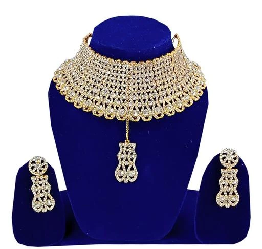 Checkout this latest Jewellery Set
Product Name: *Diva Graceful Jewellery Sets*
Base Metal: Brass
Plating: Gold Plated
Stone Type: Artificial Stones
Sizing: Adjustable
Type: As Per Image
 Gold Plated Stone Choker Jewellery Set consist with pair of earrings,maang tikka, Stone necklace. This stylish party wear Choker necklace jewellery set is made of White Stone which looks stylish and goes perfect with any attire.This stone choker jewellery Set gives Traditional, classic,ethnic look for Women and Girls. 
Country of Origin: India
Easy Returns Available In Case Of Any Issue


SKU: JMAB-065
Supplier Name: rkcollec.

Code: 874-79210801-9911

Catalog Name: Diva Graceful Jewellery Sets
CatalogID_22203698
M05-C11-SC1093