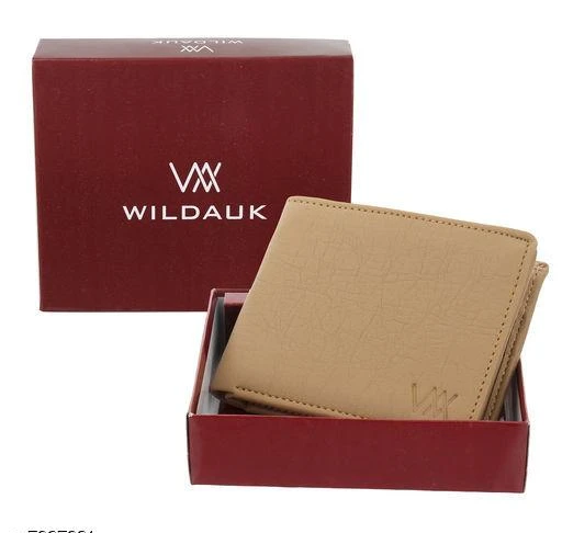 Checkout this latest Wallets
Product Name: *WILDAUK  Men Casual, Travel, Formal Beige Artificial Leather Wallet - Regular Size  (10 Card Slots)*
Material: Leather
No. of Compartments: 2
Pattern: Textured
Net Quantity (N): 1
Sizes: Free Size (Length Size: 8 cm, Width Size: 11 cm) 
The best quality of the leather is used for this album wallet. While holding this WILDAUK wallet you will get the natural leather material feel. It comes with strong stitching quality with high-quality thread that adds more durability to the wallet. A Classy Style Wallet for Men. A compact size wallet which can be easily fitted into your pocket. It has enough space and compartments to keep your money, cards, IDs, and bills in it without any hotchpotch. The album wallet has additional sleeves to keep photos & card safe. This additional sleeves for photos & Cards bring attraction to the wallet and also adds a new style to the wallet. It keeps the money and every stuff of the wallet safe from falling. The high-quality artificial leather makes this wallet durable and the first choice of most of the men. It is a compact wallet which you can easily carry with you anywhere. Whether you are travelling by bus, car or bike, the wallet is easily portable with you anywhere. It is lightweight too. A perfect gift accessory for a man. Gifting this perfect card and money organizer wallet to your boyfriend, husband, daddy, uncle will impress them. Safety Instructions: Keep away from moisture, dust, pointed objects & extreme temperature.
Country of Origin: India
Easy Returns Available In Case Of Any Issue


SKU: WA-BEIGE-CHAIN-ALBUM
Supplier Name: Trade Wings Enterprises

Code: 991-7927331-135

Catalog Name: CasualTrendy Men Wallets
CatalogID_1303893
M05-C12-SC1221