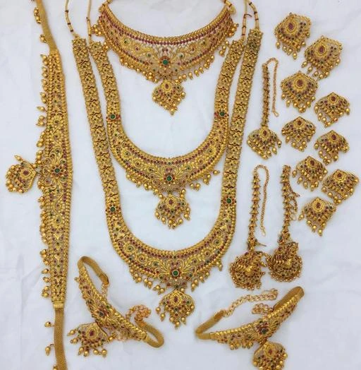 Checkout this latest Jewellery Set
Product Name: *BRIDAL SET*
Base Metal: Alloy
Plating: Gold Plated - Matte
Stone Type: Artificial Stones
Sizing: Adjustable
Type: Full Bridal Set
Net Quantity (N): 1
Product Details : Beautiful Golden Matt Finish Jewellery Bridal Set with Peacock Motifs. A Perfect Bridal Set for eve19ry Indian Girl or Women for any Bridal or auspicious occasion. This unmatchable Bridal Set Contains the Following 1 Choker Necklace Set 1 Long Layered Rani Haar 1 Pair of Matching Earrings 1 Pair of Hathphool 1 Piece Nath 1 Matha Patti 1 Maang Tika 1 Pasa Set (Headgear). Weight 687 Grams Double Quality Check passed Superior quality and skin friendly: high quality as per both domestic and international standards that makes it perfectly fall on the body with no allergy to the skin. it has been made from toxic free materials anti-allergic and safe for skin. it can be worn over long time periods without any complains such as itching, rashes and swelling. Manufactured by Highest and premium quality material this product assures to remain in its original glory even after years of usage. Lifetime Gift : An ideal Wedding, valentine, birthday, anniversary gift your loved ones. women love jewellery; specially traditional jewellery adore a women. they wear it on different occasion they have huge significance on, wedding, engagement, anniversary and festive time. We can also recommend women to also wear it on regular basics. Nagneshi Art jewellery manufacturer who not only manufacture the jewellery but also resell it to many of the resellers. With 100% genuine quality prod
Country of Origin: India
Easy Returns Available In Case Of Any Issue


SKU: CHIGOLD 6217
Supplier Name: CHIGOLD FASHION

Code: 7151-81284161-5955

Catalog Name: Shimmering Graceful Jewellery Sets
CatalogID_22920279
M05-C11-SC1093
.