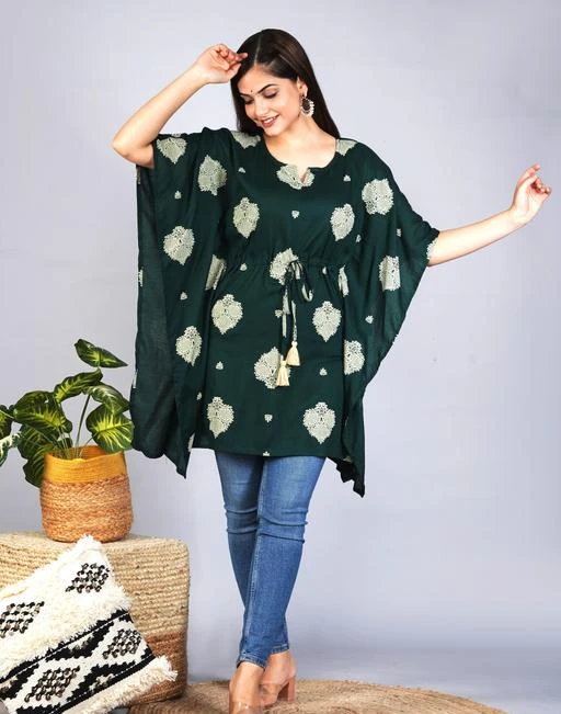Checkout this latest Long Kaftans
Product Name: *Daksh Green Printed Women Kaftan*
Fabric: Viscose Rayon
Sleeve Length: Three-Quarter Sleeves
Pattern: Printed
Multipack: 1
Sizes:
S (Bust Size: 36 in, Length Size: 35 in) 
XL (Bust Size: 42 in, Length Size: 35 in) 
L (Bust Size: 40 in, Length Size: 35 in) 
M (Bust Size: 38 in, Length Size: 35 in) 
XXL (Bust Size: 44 in, Length Size: 35 in) 
Daksh Green Printed Women Kaftan With Tussels and Doori
Country of Origin: India
Easy Returns Available In Case Of Any Issue


SKU: DS,133GRN
Supplier Name: Dakshu Enterprises

Code: 953-82424454-999

Catalog Name: Trendy Glamorous Women Kaftan Tops & Tunics
CatalogID_23291880
M04-C07-SC1009