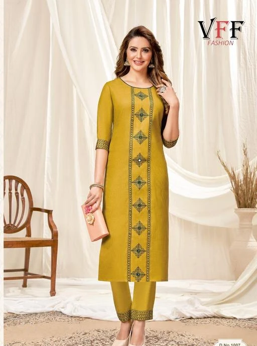 Checkout this latest Kurta Sets
Product Name: *Aishani Attractive Women Kurta Sets*
Kurta Fabric: Cotton Blend
Bottomwear Fabric: Cotton Blend
Fabric: Cotton Blend
Sleeve Length: Three-Quarter Sleeves
Set Type: Kurta With Bottomwear
Bottom Type: Pants
Pattern: Embroidered
Net Quantity (N): Single
Sizes:
S (Bust Size: 36 in, Shoulder Size: 13 in, Kurta Waist Size: 32 in, Kurta Hip Size: 40 in, Kurta Length Size: 40 in, Bottom Waist Size: 34 in, Bottom Hip Size: 40 in, Bottom Length Size: 11 in) 
M (Bust Size: 38 in, Shoulder Size: 13.5 in, Kurta Waist Size: 34 in, Kurta Hip Size: 42 in, Kurta Length Size: 40 in, Bottom Waist Size: 36 in, Bottom Hip Size: 42 in, Bottom Length Size: 12 in) 
L (Bust Size: 40 in, Shoulder Size: 14 in, Kurta Waist Size: 36 in, Kurta Hip Size: 44 in, Kurta Length Size: 40 in, Bottom Waist Size: 38 in, Bottom Hip Size: 44 in, Bottom Length Size: 13 in) 
XL (Bust Size: 42 in, Shoulder Size: 14.5 in, Kurta Waist Size: 38 in, Kurta Hip Size: 46 in, Kurta Length Size: 40 in, Bottom Waist Size: 40 in, Bottom Hip Size: 46 in, Bottom Length Size: 14 in) 
XXL (Bust Size: 44 in, Shoulder Size: 15 in, Kurta Waist Size: 40 in, Kurta Hip Size: 48 in, Kurta Length Size: 40 in, Bottom Waist Size: 42 in, Bottom Hip Size: 48 in, Bottom Length Size: 15 in) 
Vaishali Fashion is a premium fusion Designers Kurtis brand and Hub of Designer Imported Fabric Kurtis. Which merges Indian and western sensibilities with an emphasis on distinctive design and styling. Understanding the changing fashion requirements of women, we felt the need of a one-stop solution for all their style queries. With the same thought, we introduced the brand Vaishali Fashion that caters primarily to the work and casual wear requirements of modern Indian women who have an independent mindset. We also did an in-depth market research and data analysis to accentuate the fit, quality and comfort of our products. We believe our data-centric approach, supported by our innovative and institutionalized design process and experienced design team allows us to develop new and differentiated trends. Keeping the pace with ever-evolving demand of fashion-conscious genre, we have also explored trendy minimalist occasion wear. Hand wash. Never Shrink and never Dull Color. Height is 44 Inch. Size available :- S to 4XL
Country of Origin: India
Easy Returns Available In Case Of Any Issue


SKU: VFF TANYA MUSTARD 
Supplier Name: Dello Fashion

Code: 814-82767767-9981

Catalog Name: Aishani Attractive Women Kurta Sets
CatalogID_23405250
M03-C04-SC1003