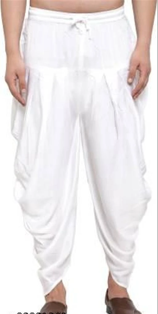 Checkout this latest Dhotis, Mundus & Lungis
Product Name: *Ishani  Men's Ethnic White Dhoti Pant for festival, Party and Wedding Solid Men Dhoti*
Fabric: Rayon
Pattern: Solid
Net Quantity (N): 1
Type: Dhoti
Ishani  i brings to you this Stylish yet Comfortable Men Gold Men Cotton Silk Cowl Design Patiala Style Alladin Dhoti Pant. Adorn it for a perfect Classy & Trendy look. Pair it with a juti or a mojari for the Royal feel. Royal Kurta
Sizes: 
Free Size
Country of Origin: India
Easy Returns Available In Case Of Any Issue


SKU: Men White Dhoti 03
Supplier Name: Ishani Enterprice

Code: 043-82821260-996

Catalog Name: Latest Men Dhotis, Mundus & Lungis
CatalogID_23423254
M06-C15-SC1204