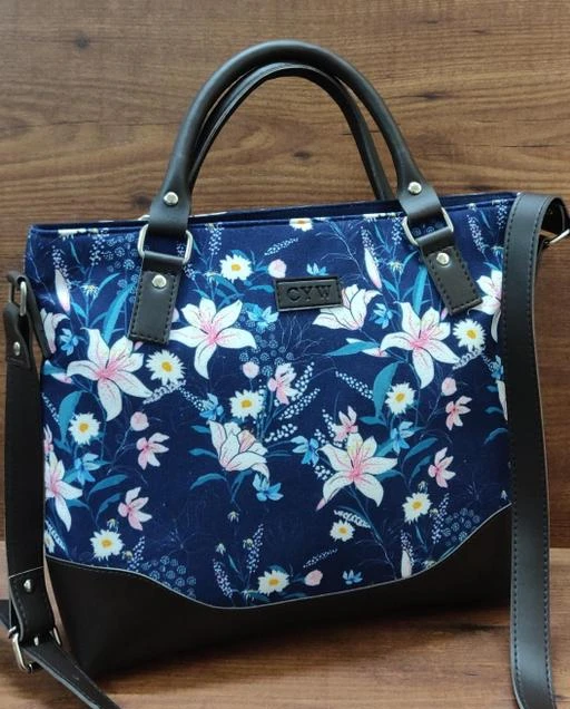 Checkout this latest Handbags (500-1000)
Product Name: *ZIPPERED HANDBAG*
Material: Fabric
No. of Compartments: 2
Sizes:Free Size (Length Size: 14 in, Width Size: 3 in, Height Size: 11 in) 
BEAUTIFUL FLORAL PRINTED HANDBAG WITH ADJUSTABLE STRAP FOR ALL YOUR FASHION NEEDS .HAVING PU BOTTOM WITH ZIPPERED TOP & BACK POCKET TO KEEP ALL YOUR THINGS INT VERY CONVENIENT & EASY TO CARRY ALL YOUR UTILITIES.ACT.
Easy Returns Available In Case Of Any Issue


SKU: T 143
Supplier Name: TAB ENTERPRISES

Code: 214-82868874-9921

Catalog Name: Voguish Fancy Women Handbags
CatalogID_23438600
M09-C27-SC5082