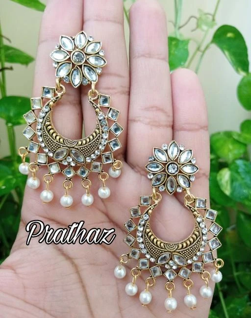 Earrings & Studs
Trendy earrings
Product name : Trendy earrings
Base Metal: Alloy
Plating: Gold Plated - Matte
Stone Type: Artificial Stones
Sizing: Adjustable
Type: Chandelier
Multipack: 1
 Description : it has one pair of earring
Country of Origin: India
Sizes Available: 

SKU: Pooja 79 (2)
Supplier Name: PRATHAZ FASHION

Code: 671-8294528-663

Catalog Name: Elite Fancy Earrings
CatalogID_1386842
M05-C11-SC1091