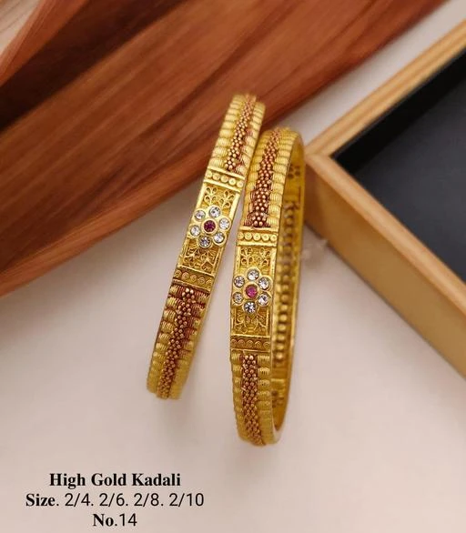 Checkout this latest Bracelet & Bangles
Product Name: *Shimmering Beautiful 1Gram Gold Diamond Bracelet & Bangles*
Base Metal: Brass
Plating: 1Gram Gold
Stone Type: Cubic Zirconia/American Diamond
Sizing: Non-Adjustable
Type: Bangle Style
Net Quantity (N): 2
Sizes:2.4, 2.6, 2.8, 2.10
This Gold Plated Bangle Set For Women is made of Brass. Traditional Jewellery Loved by every Woman. Women love jewellery more than anything else. They wear jewellery on every occasion (Wedding, Engagement, Parties, festival). We present an exclusive range of intricately designed fashion jewelry in various captivating designs and colors and we make sure that our range of Fashion Jewelry will galvanize you and will add glow to your outfit because our products are antique, comfortable, eye-catching, and fashion-forward. This Piece of Jewellery will enhance your beauty and compliment your dress. Make your moment memorable with this High-Quality traditional jewellery.
Country of Origin: India
Easy Returns Available In Case Of Any Issue


SKU: AABH 227
Supplier Name: PUSHP CREATION |

Code: 812-83594667-092

Catalog Name: Shimmering Beautiful 1Gram Gold Diamond Bracelet & Bangles
CatalogID_23676776
M05-C11-SC1094