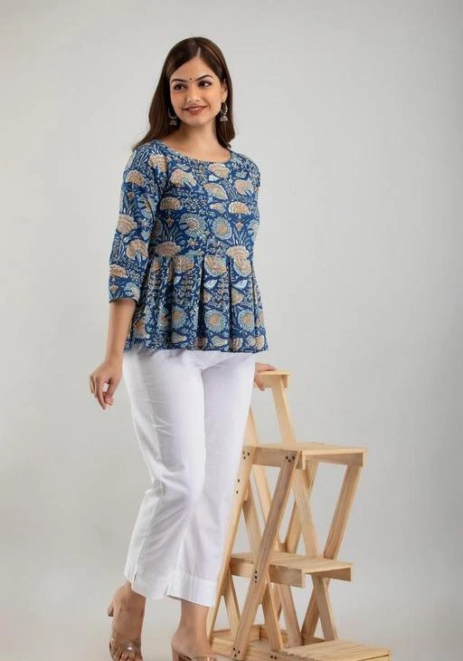 Checkout this latest Tops & Tunics
Product Name: *Womens cotton printed top, trendy top, printed top::cotton top::partywear top::festival top*
Fabric: Cotton
Sleeve Length: Three-Quarter Sleeves
Pattern: Printed
Net Quantity (N): 1
Sizes:
S (Bust Size: 36 in, Length Size: 26 in) 
M (Bust Size: 38 in, Length Size: 26 in) 
L (Bust Size: 40 in, Length Size: 26 in) 
XL (Bust Size: 42 in, Length Size: 26 in) 
XXL (Bust Size: 44 in, Length Size: 26 in) 
Womens cotton printed top, trendy top, printed top::cotton top::partywear top::festival top
Country of Origin: India
Easy Returns Available In Case Of Any Issue


SKU: LS031BLUE
Supplier Name: Shyam fashion

Code: 193-86725070-9941

Catalog Name: Trendy Partywear Women Tops & Tunics
CatalogID_24677137
M04-C07-SC1020