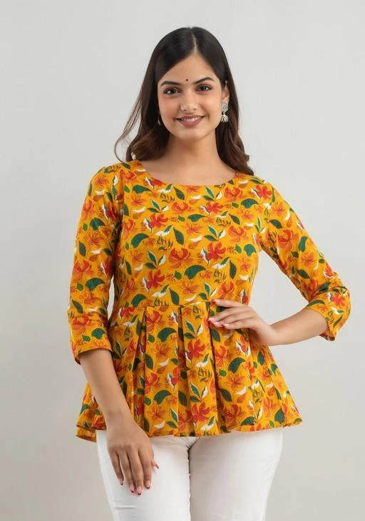 Checkout this latest Tops & Tunics
Product Name: *Womens cotton printed top, trendy top, printed top::cotton top::partywear top::festival top*
Fabric: Cotton
Sleeve Length: Three-Quarter Sleeves
Pattern: Printed
Net Quantity (N): 1
Sizes:
S (Bust Size: 36 in, Length Size: 26 in) 
M (Bust Size: 38 in, Length Size: 26 in) 
L (Bust Size: 40 in, Length Size: 26 in) 
XL (Bust Size: 42 in, Length Size: 26 in) 
XXL (Bust Size: 44 in, Length Size: 26 in) 
Womens cotton printed top, trendy top, printed top::cotton top::partywear top::festival top
Country of Origin: India
Easy Returns Available In Case Of Any Issue


SKU: LS023YELLOW
Supplier Name: Shyam fashion

Code: 193-87269480-9941

Catalog Name: Trendy Partywear Women Tops & Tunics
CatalogID_24835248
M04-C07-SC1020