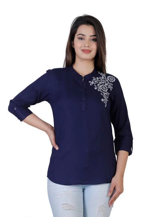 Checkout this latest Tops & Tunics
Product Name: *Fancy Fashionable Women's Tops*
Fabric: Rayon
Sleeve Length: Three-Quarter Sleeves
Pattern: Embroidered
Multipack: 1
Sizes:
XS (Bust Size: 26 in, Length Size: 26 in) 
S (Bust Size: 28 in, Length Size: 26 in) 
M (Bust Size: 30 in, Length Size: 26 in) 
L (Bust Size: 32 in, Length Size: 26 in) 
XL (Bust Size: 34 in, Length Size: 26 in) 
XXL
Easy Returns Available In Case Of Any Issue


Catalog Rating: ★4 (66)

Catalog Name: Fancy Fashionable Women's Tops
CatalogID_1501899
C79-SC1020
Code: 882-8784468-396