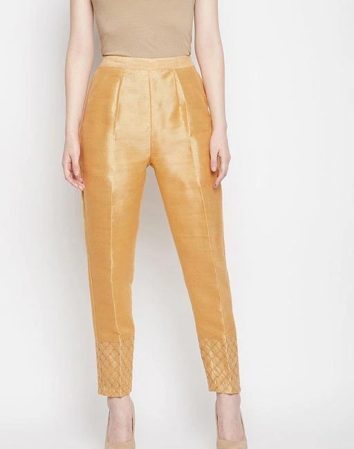 Checkout this latest Trousers & Pants
Product Name: *XTYLIS FASHION Women's Silk Gold Stripe Embroidery Pants/Trousers*
Fabric: Silk
Pattern: Embroidered
Net Quantity (N): 1
Sizes: 
28 (Waist Size: 28 in, Length Size: 38 in) 
30 (Waist Size: 30 in, Length Size: 38 in) 
32 (Waist Size: 32 in, Length Size: 38 in) 
34 (Waist Size: 34 in, Length Size: 38 in) 
36 (Waist Size: 36 in, Length Size: 38 in) 
38 (Waist Size: 38 in, Length Size: 38 in) 
XTYLIS FASHION Care Instructions: Hand Wash Only Fit Type: Regular Fit Type: Straight Best Pant for women and girls, Skin Friendly and Comfy 2 Side pockets, boot cut, elasticated half waist with belt loop adds to better size adjustment Occasion: Formal, Casual and Party Waist Size M-28-30, L-30-32, XL-32-34, 2XL-34-36, 3XL-36-38 Shop from a wide range of Casual or formal Trousers from XTYLIS FASHION Perfect for your everyday use. Composed with premium silk fabric featuring an elasticized waistband and both side pockets, Mid-rise Slim Fit Pants with side vents at the hem. Compliments a top or a kurta for a perfect formal look.
Country of Origin: India
Easy Returns Available In Case Of Any Issue


SKU: SILK SKIN PANT 
Supplier Name: xtylis fashion

Code: 943-91555217-999

Catalog Name: Comfy Fashionista Women Women Trousers 
CatalogID_26142907
M04-C08-SC1034