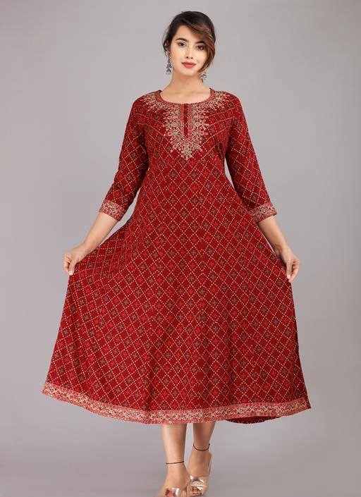 Checkout this latest Kurtis
Product Name: *Women Embroidered Rayon Anarkali Kurta (Maroon)*
Fabric: Rayon
Sleeve Length: Three-Quarter Sleeves
Pattern: Printed
Combo of: Single
Sizes:
M (Bust Size: 38 in, Size Length: 50 in) 
L (Bust Size: 40 in, Size Length: 50 in) 
The flared kurti that you are seeing, this flared kurti gives a very attractive look. After wearing this, you will look very cute and beautiful. Because this flared kurti has been designed according to the coming trending fashions time.And this flared kurti is made of rayon fabric. Which is absolutely correct according to every season or in a way we can say.  latest kurta and kurti,kurti,kurti under 300 for women,latest kurti for women,new design kurti,stylish kurti for girls,party wear kurtis,anarkali,gowns,casual kurti.
Country of Origin: India
Easy Returns Available In Case Of Any Issue


SKU: MAROON - EMBROIDERED-BANDHEJ - GOWN 01 
Supplier Name: ISHIN FAB

Code: 315-92419686-9981

Catalog Name: Alisha Petite Kurtis
CatalogID_26412209
M03-C03-SC1001