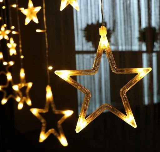 Checkout this latest Table Lamps_500-1000
Product Name: *Mr Brand Creation Star Curtain Lights 138 LED Star String with 10 Lights Stars Shaped String Lights Plug in Curtain Lights for Bedroom, Wedding, Party, Christmas, Decorations for Home (Yellow Color)*
Material: Plastic
Waterproof: No
Pack: Pack of 1
Product Length: 15 cm
Product Breadth: 15 cm
Product Height: 1.5 cm
Country of Origin: India
Easy Returns Available In Case Of Any Issue


SKU: NRSTL-MBC001
Supplier Name: NIDHDHI CREATION

Code: 893-9429398-6801

Catalog Name: Fabulous Table Lamps
CatalogID_1656054
M08-C25-SC1416