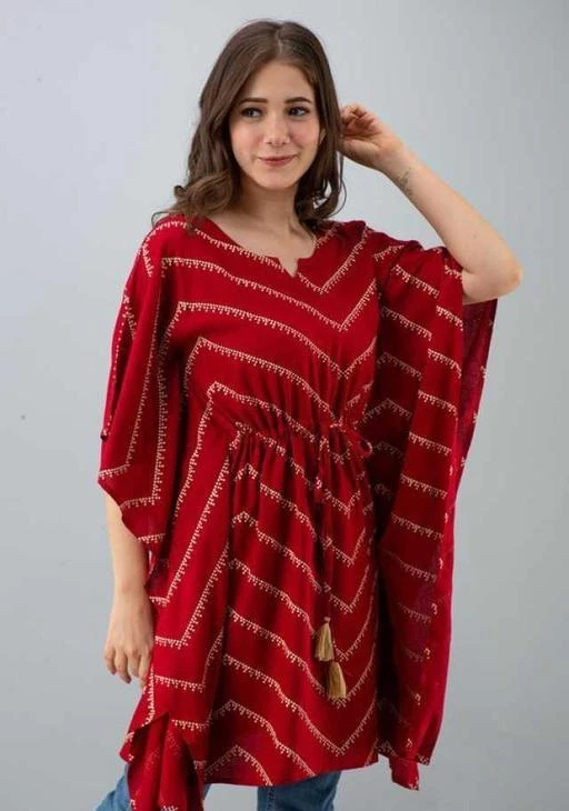 Checkout this latest Long Kaftans
Product Name: *Women Rayon Stylish Printed Maroon Kaftan *
Fabric: Rayon
Sleeve Length: Short Sleeves
Pattern: Printed
Multipack: 1
Sizes:
S (Bust Size: 36 in, Length Size: 40 in) 
XL (Bust Size: 42 in, Length Size: 40 in) 
L (Bust Size: 40 in, Length Size: 40 in) 
M (Bust Size: 38 in, Length Size: 40 in) 
XXL (Bust Size: 44 in, Length Size: 40 in) 
Showcasing a charming hand block-printed pattern,Kaftan is handcrafted in a breezy silhouette. Styled in soft Rayon fabric,
Country of Origin: India
Easy Returns Available In Case Of Any Issue


SKU: PE-Maroon-Kaftan
Supplier Name: PAKIZA ENTERPRISES786

Code: 272-94676125-999

Catalog Name: Fancy Glamorous Women kaftan
CatalogID_27108517
M04-C07-SC1009