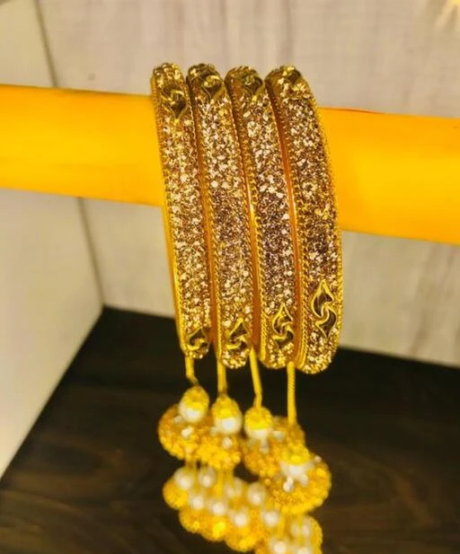 Checkout this latest Bracelet & Bangles
Product Name: *Feminine Unique Bracelet & Bangles*
Base Metal: Plastic
Plating: No Plating
Stone Type: Cubic Zirconia/American Diamond
Sizing: Non-Adjustable
Type: Danglers
Net Quantity (N): 4
Sizes:2.2, 2.4, 2.6, 2.8, 2.10
beautiful kalire type latkan bangles
Country of Origin: India
Easy Returns Available In Case Of Any Issue


SKU: GENmKthk
Supplier Name: Bangles Empire

Code: 311-94712082-981

Catalog Name: Feminine Unique Bracelet & Bangles
CatalogID_27120358
M05-C11-SC1094