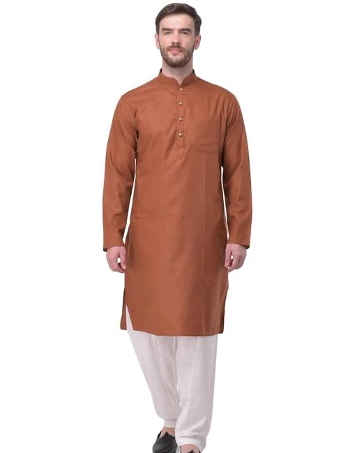 Checkout this latest Kurta Sets
Product Name: *SG LEMAN Rust Kurta Set For Men*
Top Fabric: Cotton Blend
Bottom Fabric: Art Silk
Scarf Fabric: No Scarf
Sleeve Length: Long Sleeves
Bottom Type: Straight Pajama
Stitch Type: Stitched
Pattern: Solid
Sizes:
S (Chest Size: 40 in, Top Length Size: 41 in, Bottom Waist Size: 30 in, Bottom Length Size: 41 in) 
XXL (Chest Size: 48 in, Top Length Size: 45 in, Bottom Waist Size: 38 in, Bottom Length Size: 45 in) 
4XL (Chest Size: 52 in, Top Length Size: 47 in, Bottom Waist Size: 42 in, Bottom Length Size: 47 in) 
SG LEMAN presenting here the latest designer Kurta and pajama perfectly for ethnic, casual as well as party wear. These are designed to absolute perfection, this designer kurta looks very trendy to show & that too keeps you at easy whenever you wear this. This have exclusive designes that gives you a royal & charming look. It immediately grabs the attention of the people around you and makes you look attractive and elegant. This Kurta pajama set is very light in weight. We are a leading brand in Men wear with wide range of Men clothing which includes Men ethnic wear,Men Straight kurta,kurta pajama, Men sherwani ,Nehru jacket, Indo western and a lot more.
Country of Origin: India
Easy Returns Available In Case Of Any Issue


SKU: Meesho-31165-RUST
Supplier Name: SG YUVRAJ

Code: 158-96208484-9942

Catalog Name: Elegant Men Kurta Sets
CatalogID_27554690
M06-C18-SC1201