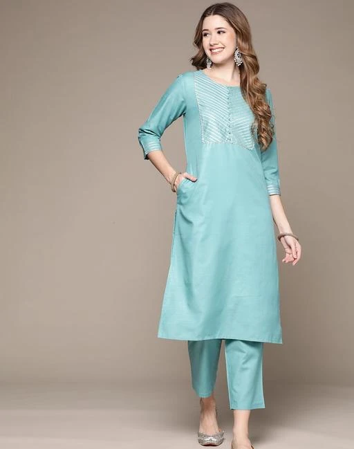 Checkout this latest Kurta Sets
Product Name: *Women's Sky Blue Gotta Patti Kurta Set with Trousers*
Kurta Fabric: Cotton Blend
Bottomwear Fabric: Cotton Blend
Fabric: Cotton Blend
Sleeve Length: Three-Quarter Sleeves
Set Type: Kurta With Bottomwear
Bottom Type: Pants
Pattern: Solid
Net Quantity (N): Single
Sizes:
S (Bust Size: 37 in, Shoulder Size: 14.5 in, Kurta Waist Size: 32 in, Kurta Hip Size: 40 in, Kurta Length Size: 44 in, Bottom Waist Size: 33 in, Bottom Hip Size: 40 in, Bottom Length Size: 36 in, Duppatta Length Size: 2.2 in) 
L (Bust Size: 41 in, Shoulder Size: 15.5 in, Kurta Waist Size: 36 in, Kurta Hip Size: 44 in, Kurta Length Size: 44 in, Bottom Waist Size: 37 in, Bottom Hip Size: 44 in, Bottom Length Size: 36 in, Duppatta Length Size: 2.2 in) 
XL (Bust Size: 43 in, Shoulder Size: 16 in, Kurta Waist Size: 38 in, Kurta Hip Size: 46 in, Kurta Length Size: 44 in, Bottom Waist Size: 39 in, Bottom Hip Size: 46 in, Bottom Length Size: 36 in, Duppatta Length Size: 2.2 in) 
XXL (Bust Size: 45 in, Shoulder Size: 16.5 in, Kurta Waist Size: 40 in, Kurta Hip Size: 48 in, Kurta Length Size: 44 in, Bottom Waist Size: 41 in, Bottom Hip Size: 48 in, Bottom Length Size: 36 in, Duppatta Length Size: 2.2 in) 
Anubbhutee offers women's Sky Blue Gotta Patti Kurta Set with Trousers. This product has been designed keeping in mind the aim in a contemporary casual fashion. It combines ethnic with the fashion of today and makes you stand out among others when you adorn it. From casual to work and parties to pooja, it is the perfect option everytime. Pair it with chunky, bright earrings and a clutch or high heels, and a striking nose pin. Anubhutee offers a refreshing fashion for the new age endearingly beautiful Indian woman, with a constant endeavor to provide the best value. We strive to mirror magnificent workmanship by our team in each & every curated garment giving the women an elegant and exquisite style. Our collection includes different styles of ethnic wear that cater to a wide variety of the wardrobe requirements of the Indian woman.
Country of Origin: India
Easy Returns Available In Case Of Any Issue


SKU: ABWKT2102_SK
Supplier Name: Mensa brands Private Limited

Code: 768-97594306-9913

Catalog Name: Aagam Voguish Women Kurta Sets
CatalogID_27979698
M03-C04-SC1003