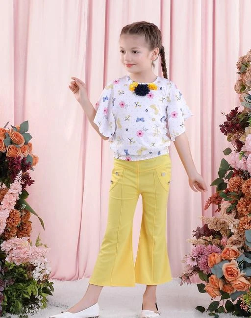 Checkout this latest Clothing Set
Product Name: *Poplins Yellow Cotton Blend Top & Trousers Clothing Set for Girls (ST-1011-YL)*
Top Fabric: Cotton
Bottom Fabric: Cotton
Sleeve Length: Short Sleeves
Top Pattern: Self Design
Bottom Pattern: Solid
Net Quantity (N): Single
Add-Ons: No Add Ons
Sizes:
3-4 Years (Top Chest Size: 23 in, Top Length Size: 15 in, Bottom Waist Size: 18.5 in, Bottom Length Size: 20 in) 
4-5 Years (Top Chest Size: 24 in, Top Length Size: 16 in, Bottom Waist Size: 19 in, Bottom Length Size: 21 in) 
5-6 Years (Top Chest Size: 25 in, Top Length Size: 17 in, Bottom Waist Size: 19.5 in, Bottom Length Size: 22 in) 
7-8 Years (Top Chest Size: 26 in, Top Length Size: 18 in, Bottom Waist Size: 20 in, Bottom Length Size: 23 in) 
9-10 Years (Top Chest Size: 27 in, Top Length Size: 19 in, Bottom Waist Size: 20.5 in, Bottom Length Size: 24 in) 
10-11 Years (Top Chest Size: 28 in, Top Length Size: 20 in, Bottom Waist Size: 21 in, Bottom Length Size: 25 in) 
12-13 Years (Top Chest Size: 29 in, Top Length Size: 21 in, Bottom Waist Size: 21.5 in, Bottom Length Size: 26 in) 
Yellow Self Design Pure Cotton Top With Trouser Set for Girls
Country of Origin: India
Easy Returns Available In Case Of Any Issue


SKU: ST-1011-YL
Supplier Name: CuteKins

Code: 824-99429091-9441

Catalog Name: Agile Funky Girls Clothing Set 
CatalogID_28548084
M10-C32-SC1147
.
